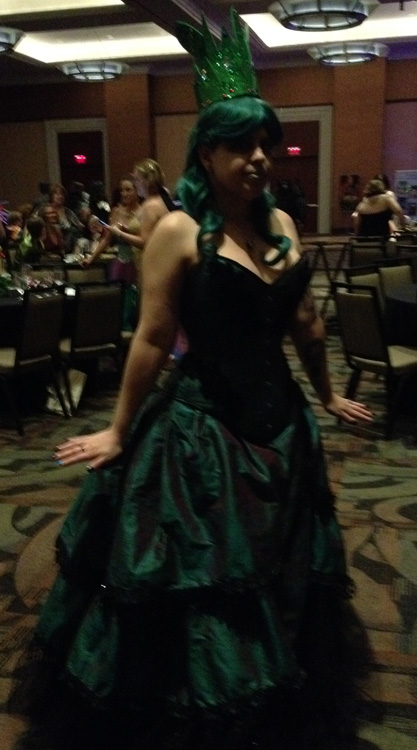 The inimitable queen of us all, without whom there would be no Authors After Dark, Stella Price, in a gown and costume befitting the Queen of the Dark. Wish my phone took better pictures in low light because the color of this was just stunning. 